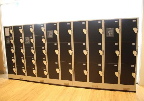 a row of lockers in a room at Fujikyu Unjokaku in Narusawa