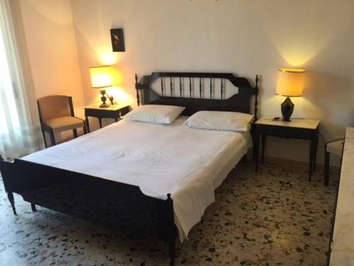 Llit o llits en una habitació de Alghero cheap holidays