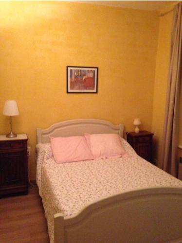 Postel nebo postele na pokoji v ubytování Maison du Charron