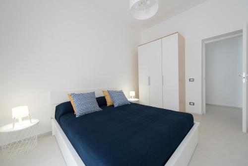 Ένα ή περισσότερα κρεβάτια σε δωμάτιο στο Laurus apartments