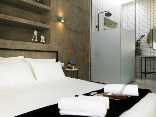 Ένα ή περισσότερα κρεβάτια σε δωμάτιο στο DECO Apartment