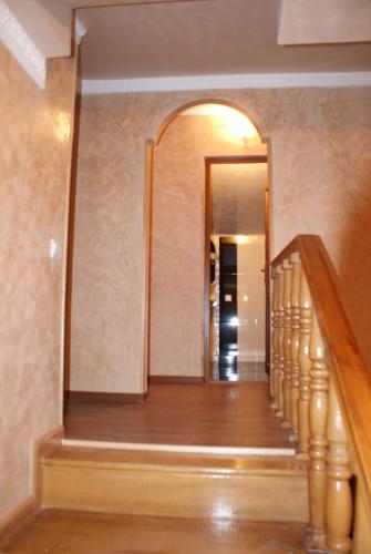 a hallway of a house with a stairway at B&B Odzun in Odzun