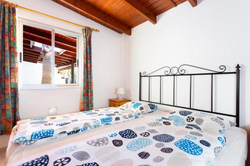 Кровать или кровати в номере Finca La Gaviota - El Rincon