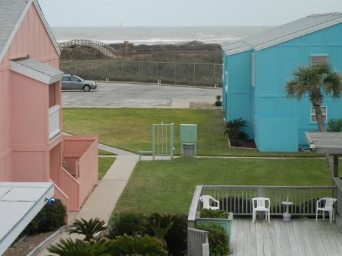 a view of the beach from the balcony of a house at Executive Keys Condominiums on the Beach in Port Aransas