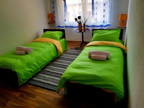 Ліжко або ліжка в номері BTO Holiday Home