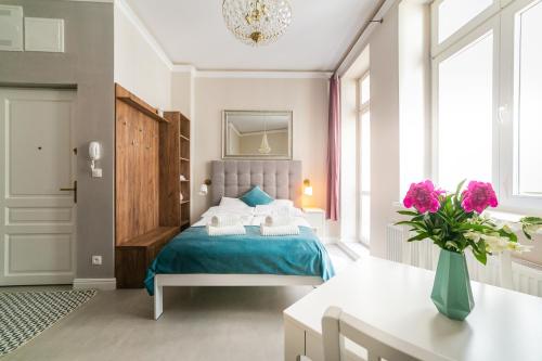 Posteľ alebo postele v izbe v ubytovaní Apartamenty Wrona | Wrona Apartments