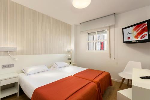 Postel nebo postele na pokoji v ubytování Crown Resorts Club Marbella