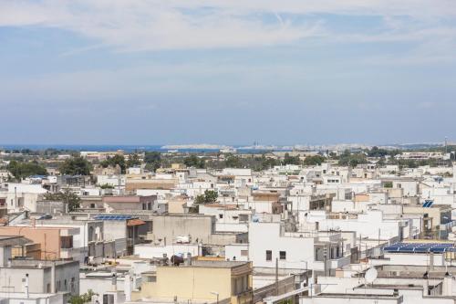 a view of a city with white buildings at Attico Saker in Racale
