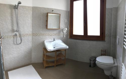 Kylpyhuone majoituspaikassa Ostello Casa Emmaus
