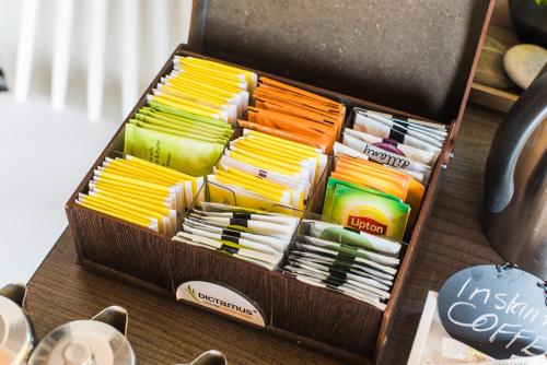 a wooden box filled with different colored pencils at Natali Apartments by Estia in Malia