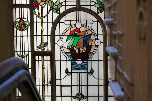 a stained glass window with at Terlon Apartments in Liverpool
