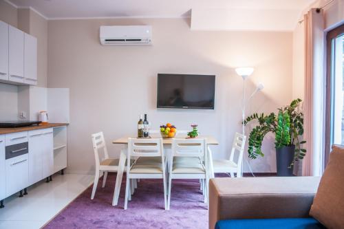 Kuchyň nebo kuchyňský kout v ubytování Apartamenty Niegocin