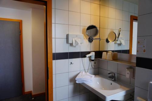 Kylpyhuone majoituspaikassa Ringhotel Altstadt