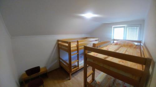 Postel nebo postele na pokoji v ubytování Hostel Srebrenica