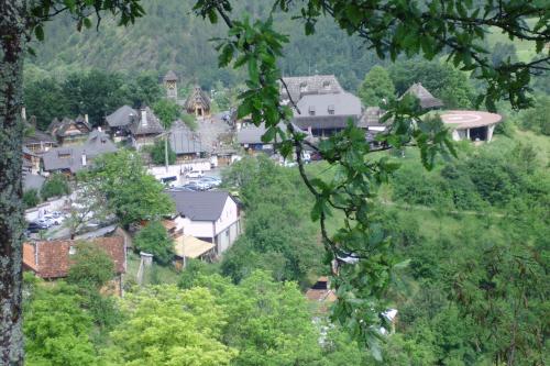 a small town in the middle of a forest at Tri bagrema KM in Mokra Gora