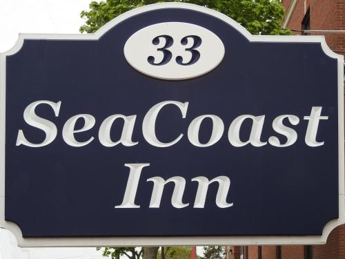 a sign for a searsccessimstration tim at SeaCoast Inn in Hyannis