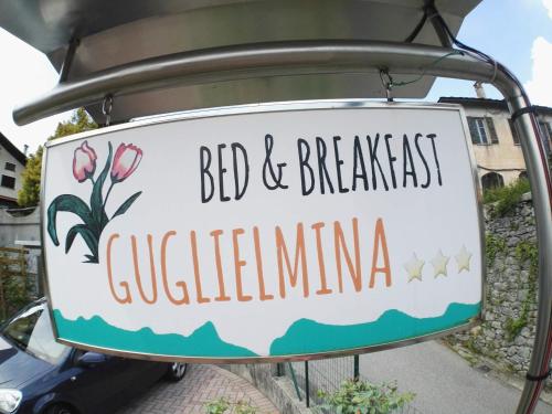 a sign for a bed and breakfast in australiana at B&B Guglielmina in Quarna Sotto