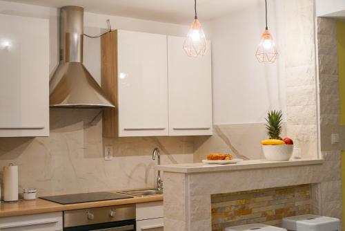 Kuchyň nebo kuchyňský kout v ubytování Apartments Aurora