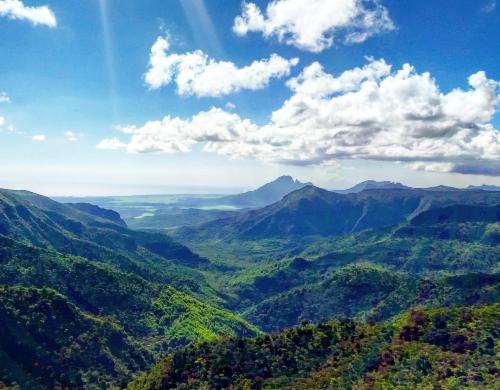 a view of a valley in the mountains at Surf House in La Gaulette