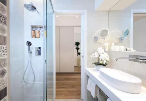 a bathroom with a shower and a sink at ★ Exclusive Central Apartment ★ FREE Garage ★ in Ljubljana