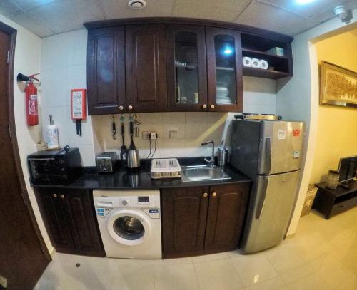 Kuchyň nebo kuchyňský kout v ubytování Haven Studio Apartments