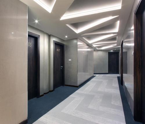 a corridor of an office building with a hallway at The Hive Hotel in Rome