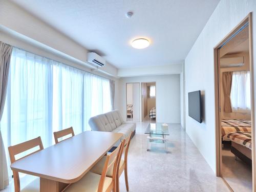 TV a/nebo společenská místnost v ubytování Mango Resort Okinawa Chatan