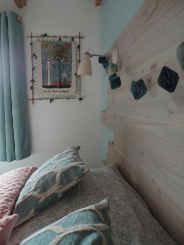 Postel nebo postele na pokoji v ubytování La Ferme sous les Hiez