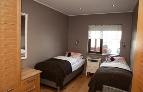 Llit o llits en una habitació de Great View Guesthouse