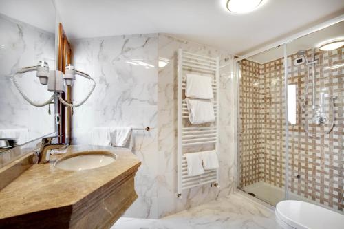 Koupelna v ubytování Hotel Casanova