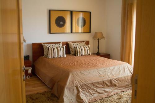 Postel nebo postele na pokoji v ubytování Casa dos capuchos