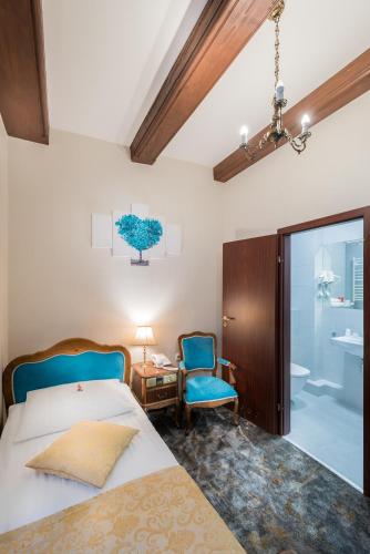 Una cama o camas en una habitación de Gotyk