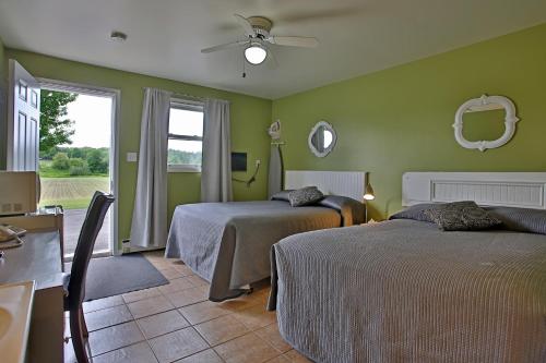 Postel nebo postele na pokoji v ubytování Motel Exquise