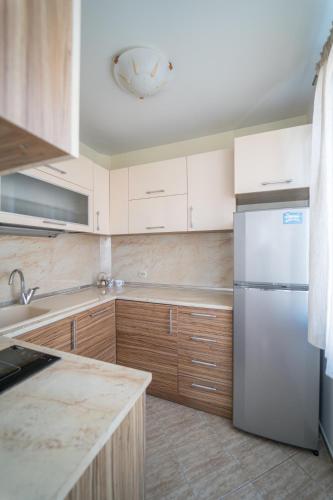 Kuchyň nebo kuchyňský kout v ubytování Hotel Mistral
