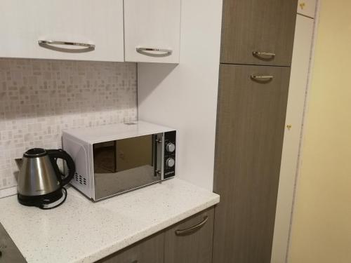 Cuisine ou kitchenette dans l'établissement Apartement SoleMar