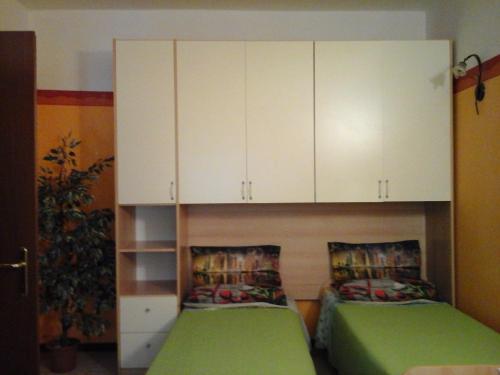 A bed or beds in a room at Appartamento del Parco