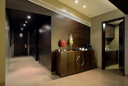 a lobby with a reception desk in a building at Sun-n-Sand Mumbai Juhu Beach in Mumbai