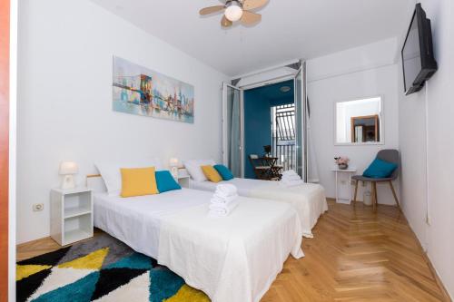 En eller flere senger på et rom på Apartment Dormir Split