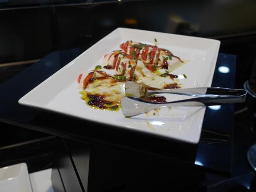 a white plate of food on a table at Sea Cruise Hotel in Sokcho