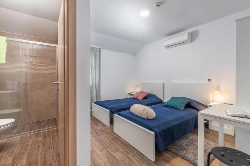 Posteľ alebo postele v izbe v ubytovaní Villa Polion Valbandon