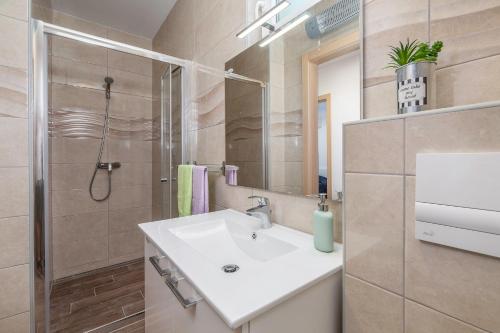 Kúpeľňa v ubytovaní Villa Polion Valbandon