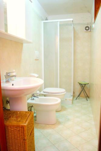 a bathroom with a toilet and a sink and a shower at Paradiso amalfi house in Amalfi