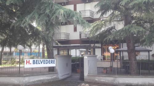 a large building with a sign that reads h beevride at Hotel Belvedere in Castrocaro Terme