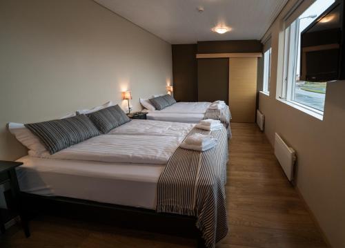 Postel nebo postele na pokoji v ubytování Hotel Post