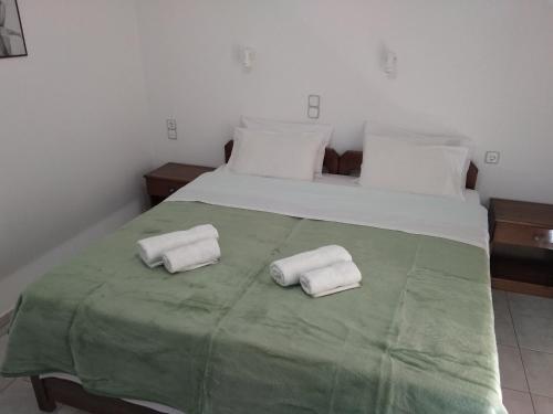 Кровать или кровати в номере Litsa Mare Apartments