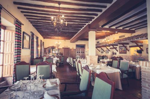 Restaurant o un lloc per menjar a Hotel Mesón de Don Quijote