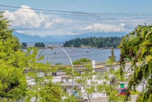 a view of a body of water with boats at Luxury Penthouse Downtown Nanaimo in Nanaimo