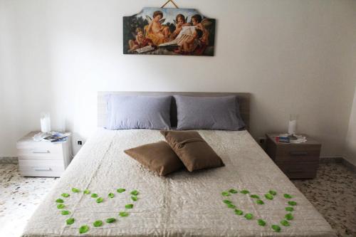 Postel nebo postele na pokoji v ubytování Gialì