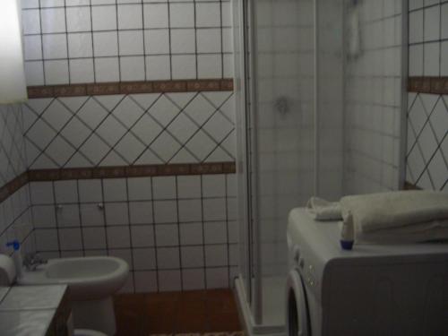 A bathroom at L'Oasi di Ambra Dependance