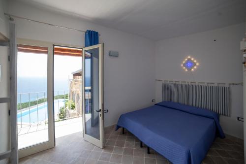 A bed or beds in a room at Casa Vacanze Galatea